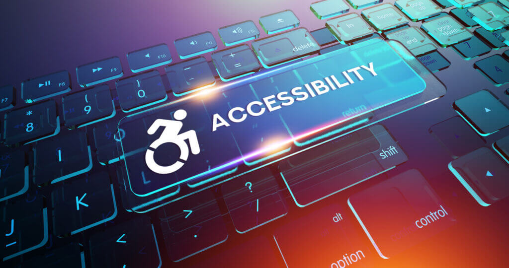 computer keyword lit up with the accessibility symbol and the word accessibility next to it
