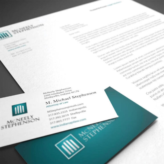 document and business card for McNeely Stephenson law office