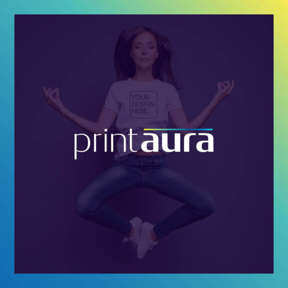 Purple image of a woman meditating with a rainbow border around it and the print aura logo in the center