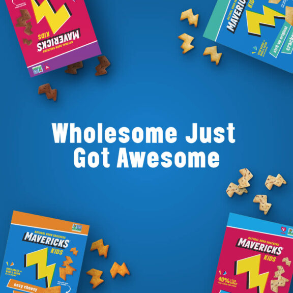 Blue graphic that says Wholesome Just Got Awesome with various Mavericks Kids snack boxes