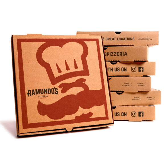 Photo of multiple Ramundo's Pizzeria boxes stacked on top of each other and one box facing the camera