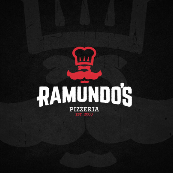 Black zoomed in Ramundo's Pizzeria logo with a white and red version of their logo over it
