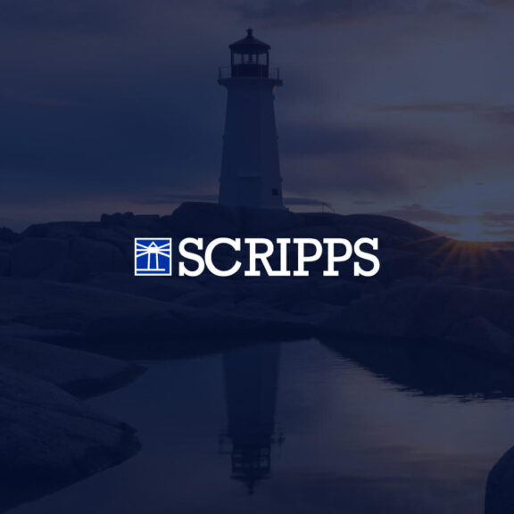 Graphic of a lighthouse overlooking the water with the Scripps logo
