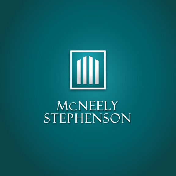 Turquoise graphic with the silver McNeely Stephenson logo