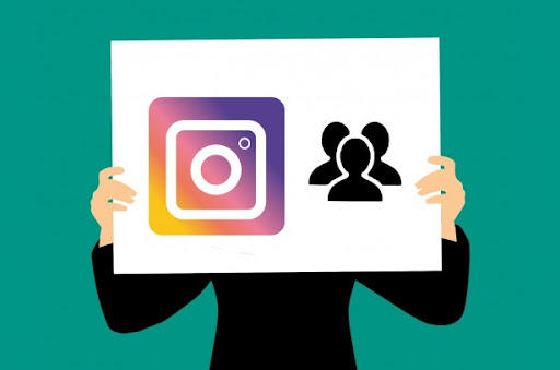 Green graphic with an illustration of a person’s hands holding a white sign with the Instagram logo on it in front of them